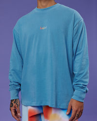 Man wearing Our Journey Oversize Heavyweight FLXCotton Long Sleeve Tee - Azure Blue | Model:Justin | Size:M