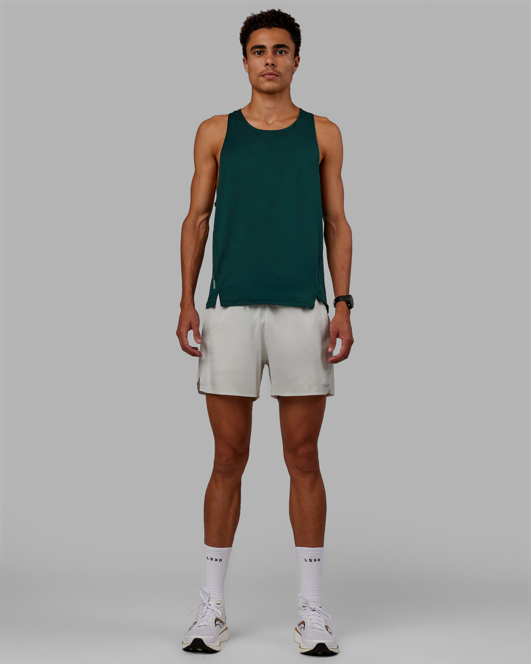 Man wearing Pace 5&quot; Lined Performance Shorts - Digital Mist-Reflective
