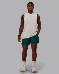 Man wearing Pace Lined Performance Short  5" in Dark Moss | Size:M