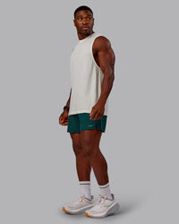 Man wearing Pace Lined Performance Short  5" in Dark Moss | Size:M