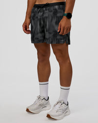 Man wearing Pace 5" Lined Running Short - Lunar Glow | Model:George | Size:M