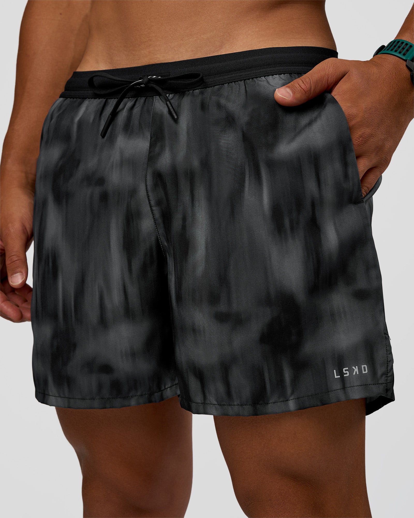 Man wearing Pace 5" Lined Running Short - Lunar Glow | Model:George | Size:M