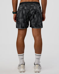 Man wearing Pace 5" Lined Running Short - Lunar Glow | Model:George | Size:M