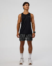 Man wearing Pace 5" Lined Running Short - Lunar Glow | Model:George | Size:M