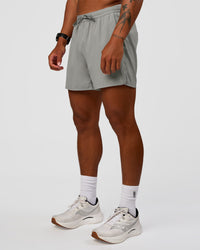 Man wearing Pace 5" Lined Running Short - Alloy | Model:Malebo | Size:M