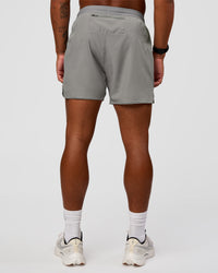 Man wearing Pace 5" Lined Running Short - Alloy | Model:Malebo | Size:M