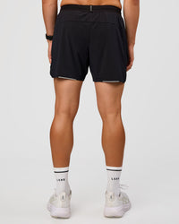 Man wearing Pace 5" Lined Ripstop Short - Black | Model:Liam | Size:M |