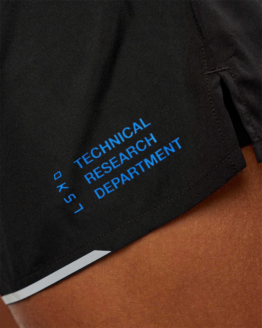 Man wearing Pace 5" Lined Running Short - Black-Lime Glo Indigo | Model:Malebo | Size:M