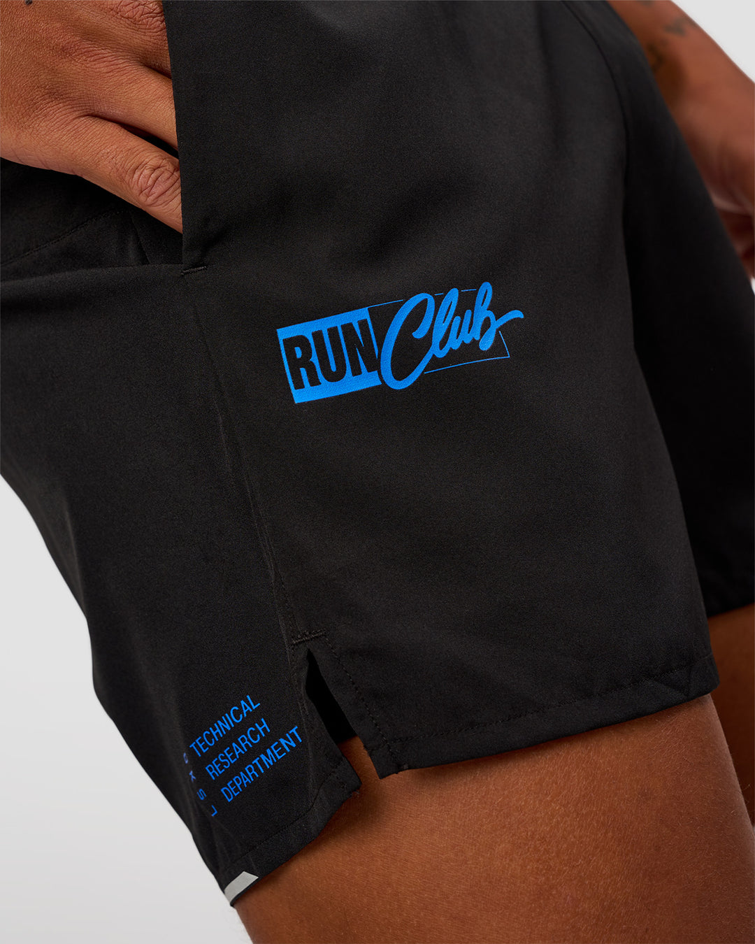 Man wearing Pace 5" Lined Running Short - Black-Lime Glo Indigo | Model:Malebo | Size:M
