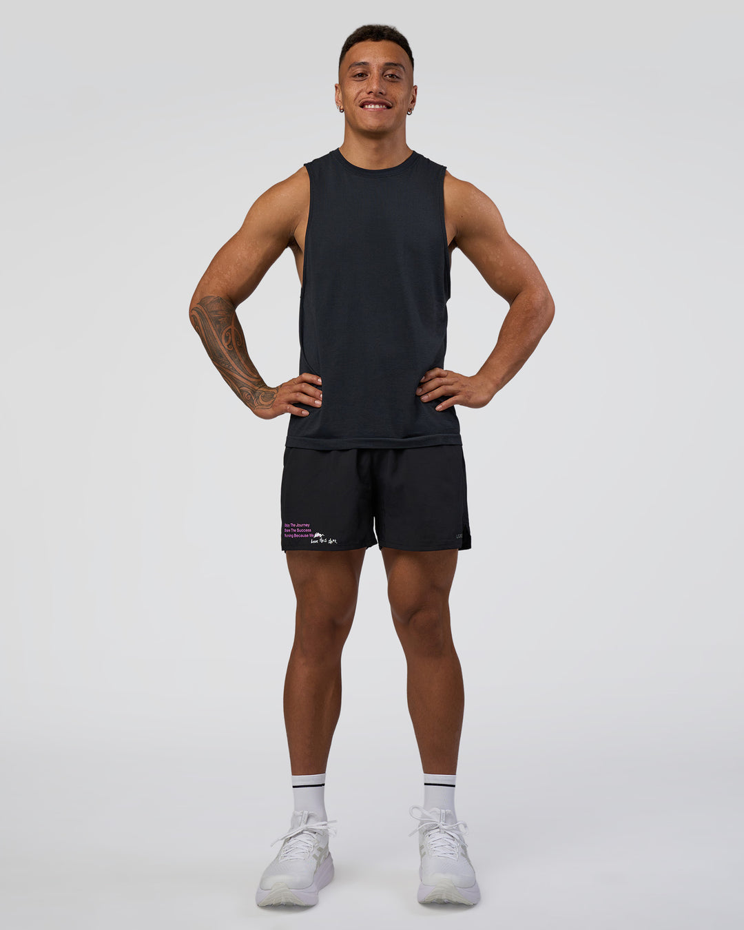 Man wearing Pace 5" Lined Running Short - Black-Ultra Fuchsia | Model:Daarian | Size:M