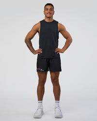 Man wearing Pace 5" Lined Running Short - Black-Ultra Fuchsia | Model:Daarian | Size:M