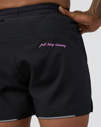 Man wearing Pace 5" Lined Running Short - Black-Ultra Fuchsia | Model:Daarian | Size:M