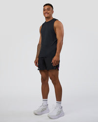 Man wearing Pace 5" Lined Running Short - Black-Ultra Fuchsia | Model:Daarian | Size:M