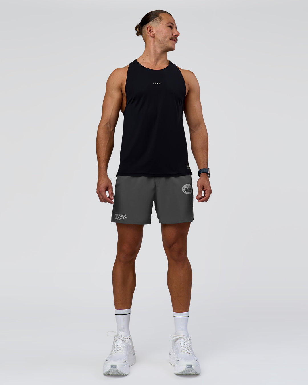 Man wearing Pace 5" Lined Running Short - Dark Storm-Alloy | Model:Jaiden | Size:M