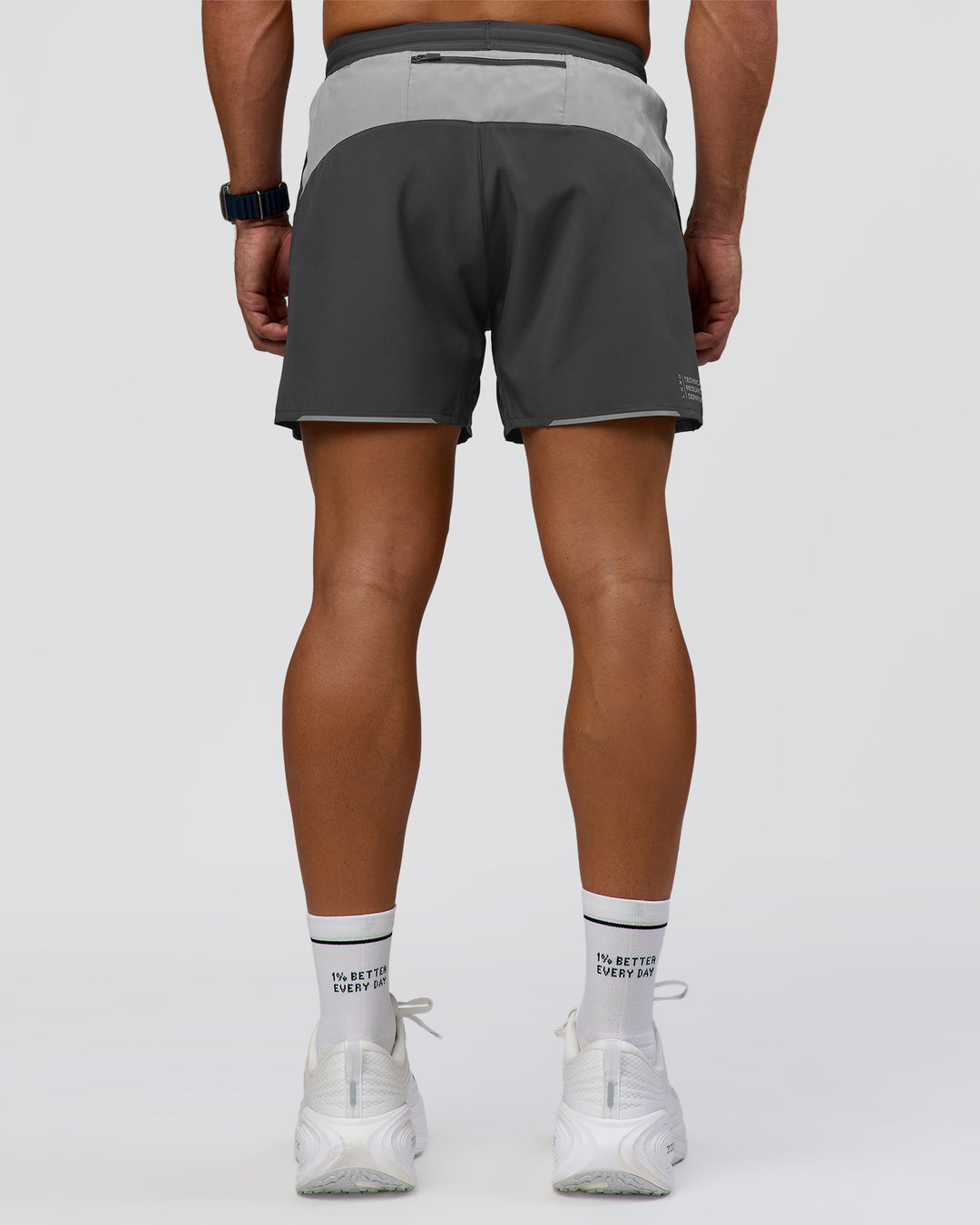 Man wearing Pace 5" Lined Running Short - Dark Storm-Alloy | Model:Jaiden | Size:M