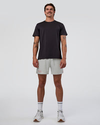 Man wearing Pace 5" Lined Running Short - Digital Mist-Flame | Model:Konnor | Size:M
