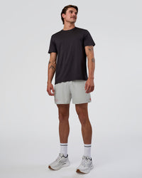 Man wearing Pace 5" Lined Running Short - Digital Mist-Flame | Model:Konnor | Size:M
