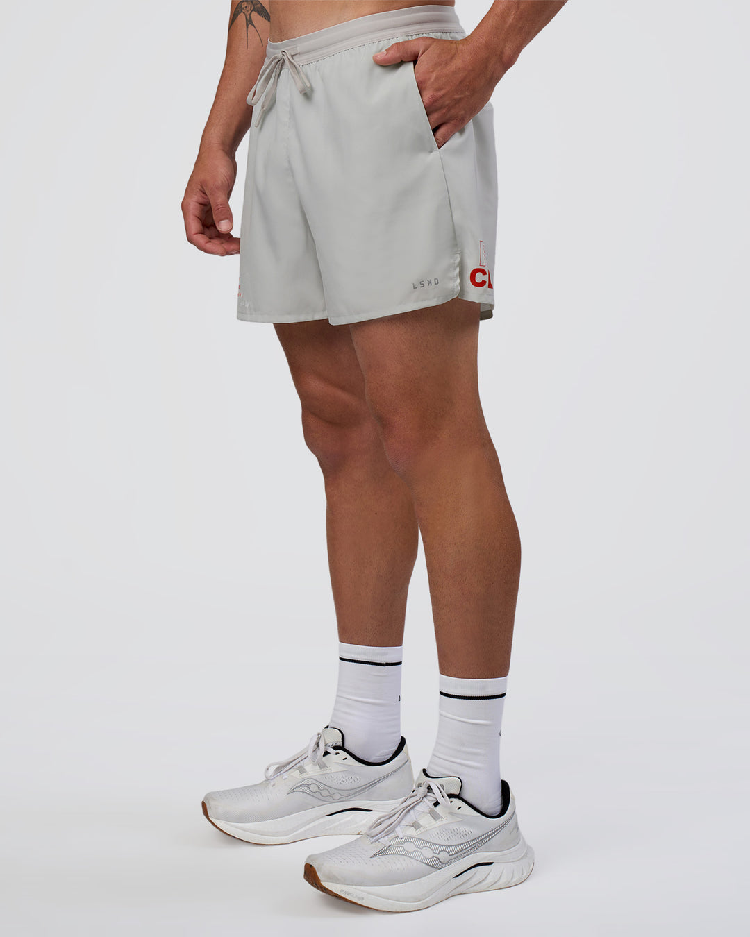 Man wearing Pace 5" Lined Running Short - Digital Mist-Flame | Model:Konnor | Size:M