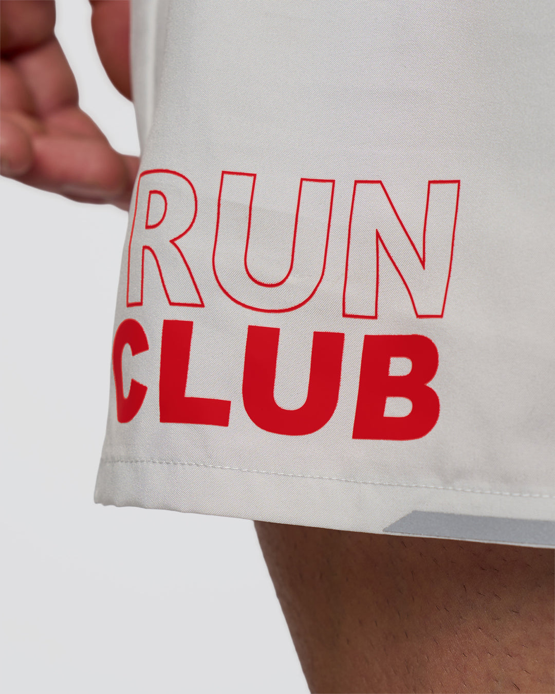 Man wearing Pace 5" Lined Running Short - Digital Mist-Flame | Model:Konnor | Size:M