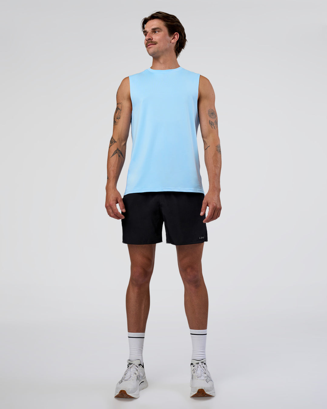 Man wearing Pace 5" Running Short - Black | Model:Konnor | Size:M