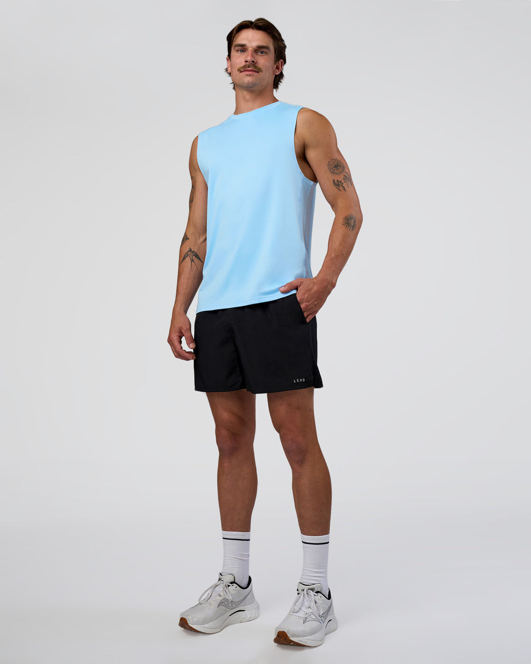 Man wearing Pace 5" Running Short - Black | Model:Konnor | Size:M