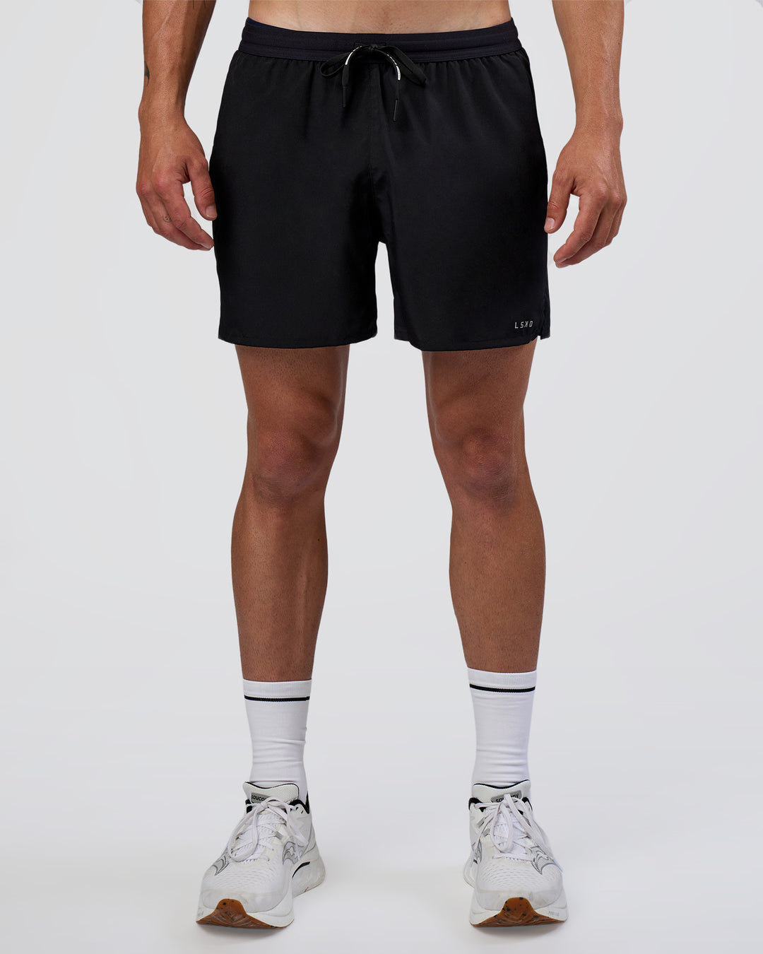 Man wearing Pace 5" Running Short - Black | Model:Konnor | Size:M