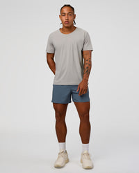 Man wearing Pace 5" Running Short - Blue Mirage | Model:Malebo | Size:M