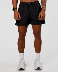 Man wearing Pace Air 5" Lined Running Short - Black | Model:Malebo | Size:M