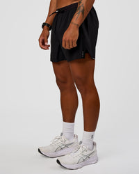 Man wearing Pace Air 5" Lined Running Short - Black | Model:Malebo | Size:M