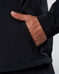 Man wearing Pace Running Jacket - Black | Model:Konnor | Size:M