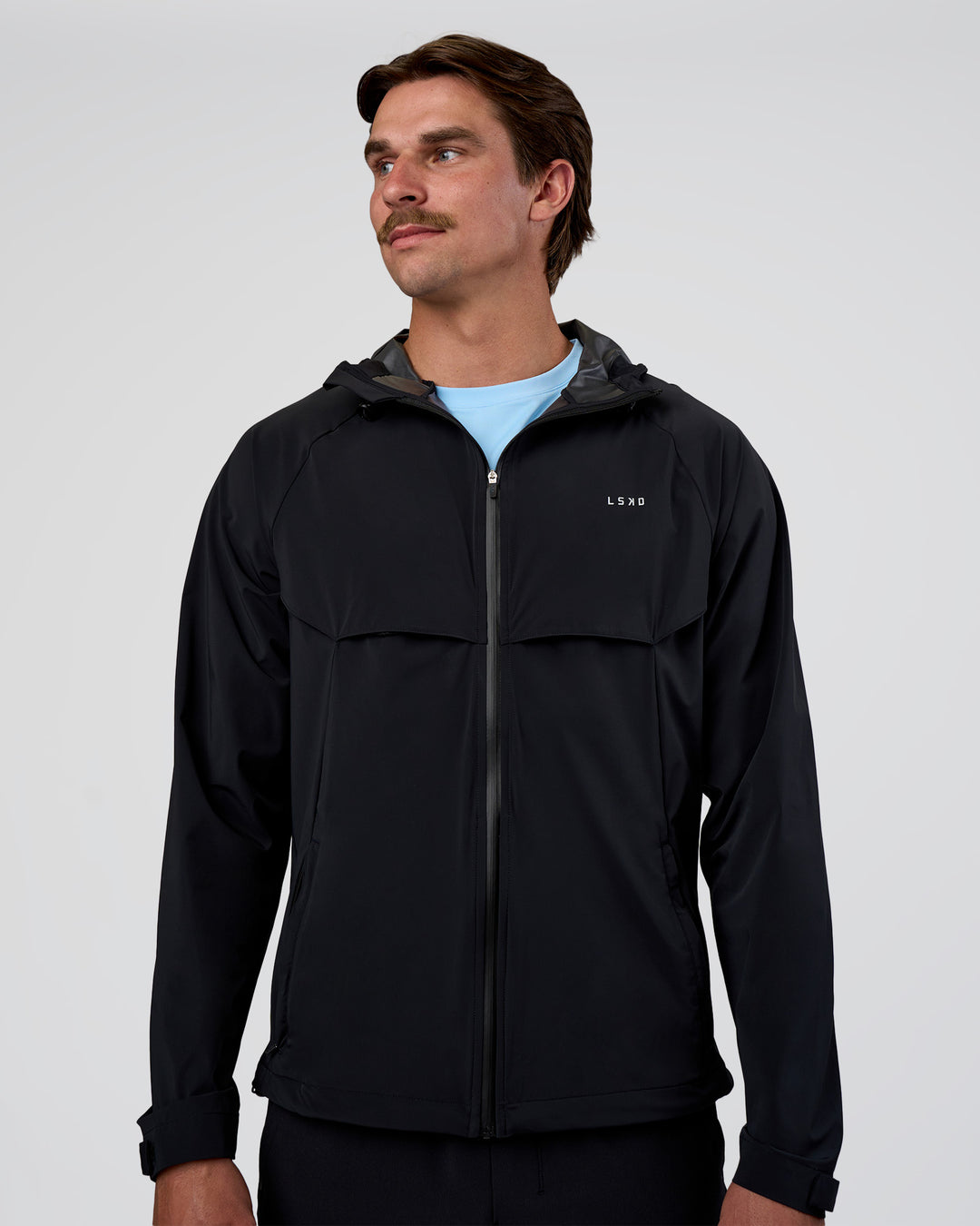 Man wearing Pace Running Jacket - Black | Model:Konnor | Size:M