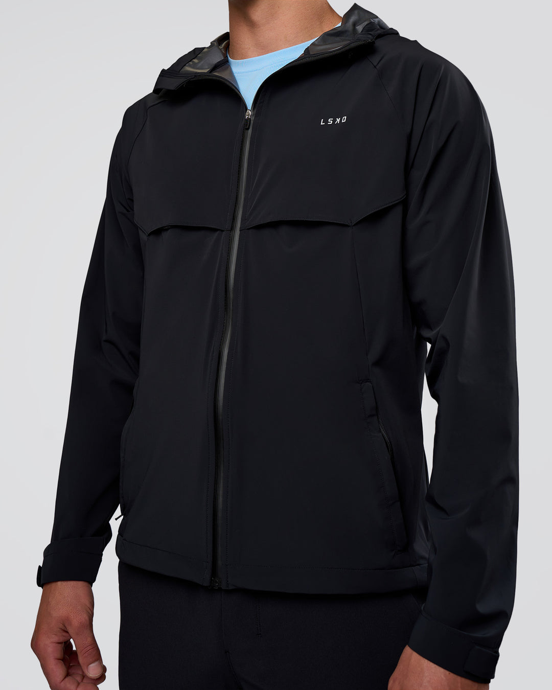 Man wearing Pace Running Jacket - Black | Model:Konnor | Size:M