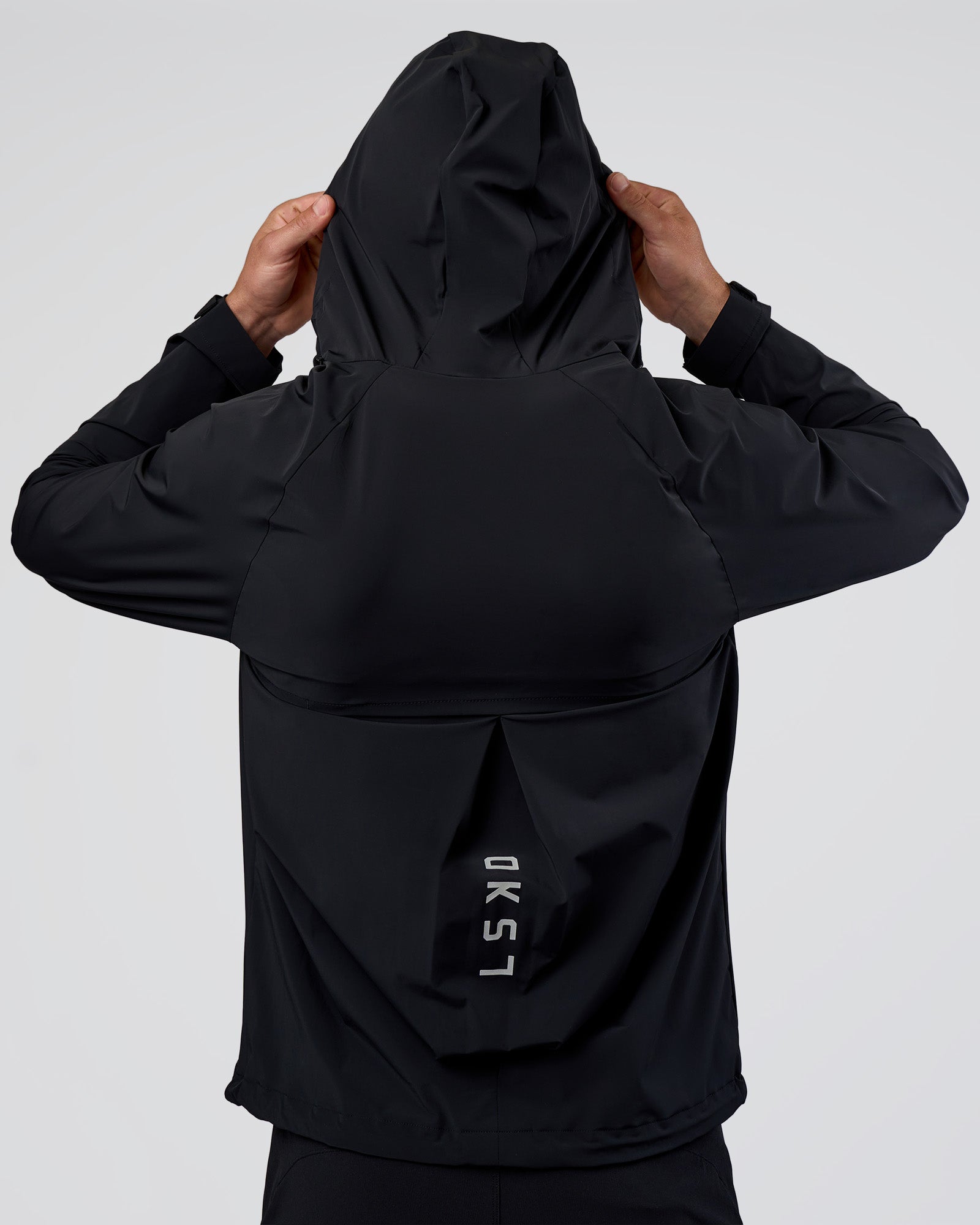 Man wearing Pace Running Jacket - Black | Model:Konnor | Size:M