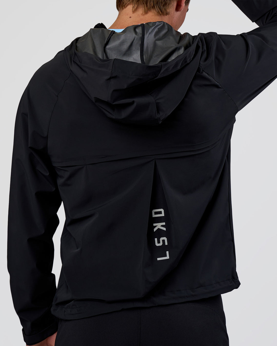 Man wearing Pace Running Jacket - Black | Model:Konnor | Size:M