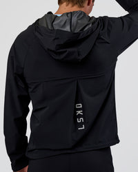 Man wearing Pace Running Jacket - Black | Model:Konnor | Size:M