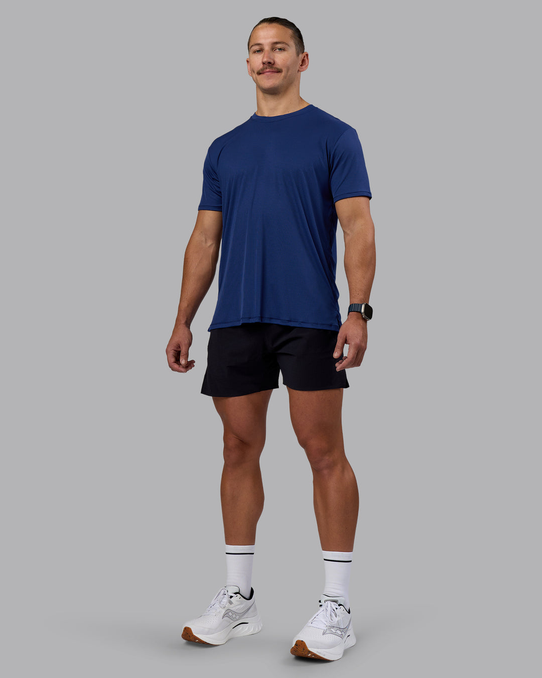 Man wearing Pace Running Tee - Midnight Blue | Model:Jaiden | Size:M
