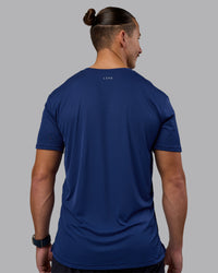 Man wearing Pace Running Tee - Midnight Blue | Model:Jaiden | Size:M