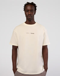 Man wearing Peaches x LSKD Collection FLXCotton Oversize Tee - Off White | Model:Okello | Size:M