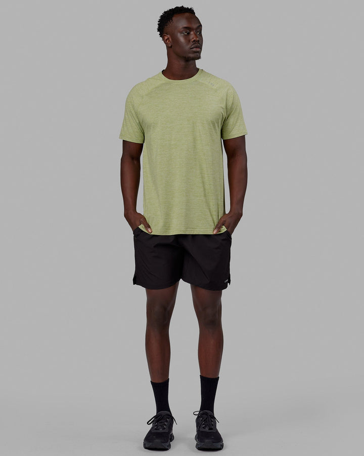 Man wearing Perform VapourFLX Tee - Moss Stone