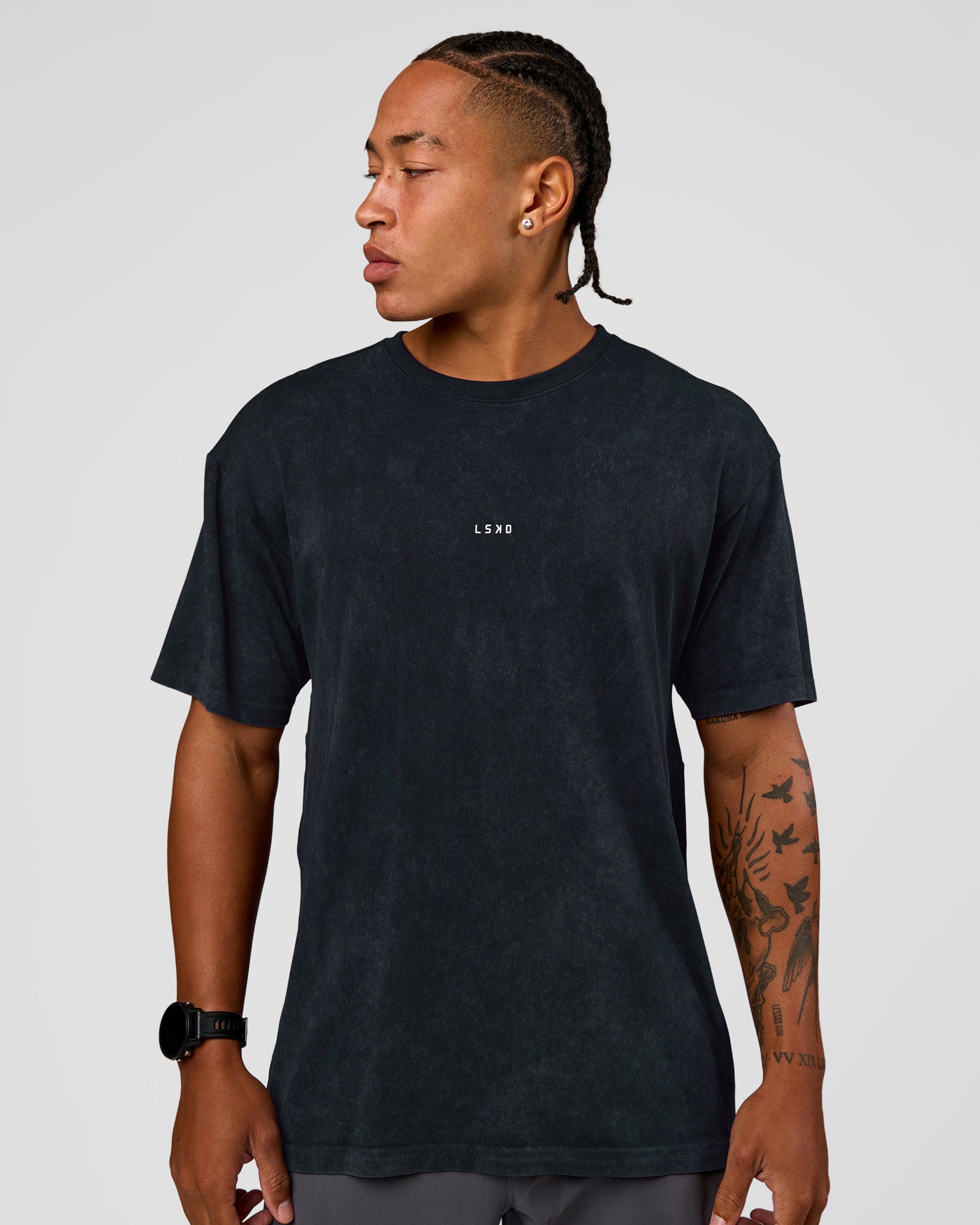 Man wearing Power Oversized Tee - Black Washed | Model:Malebo | Size:M
