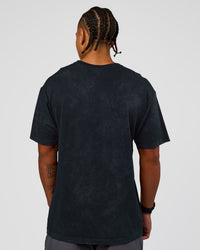 Man wearing Power Oversized Tee - Black Washed | Model:Malebo | Size:M