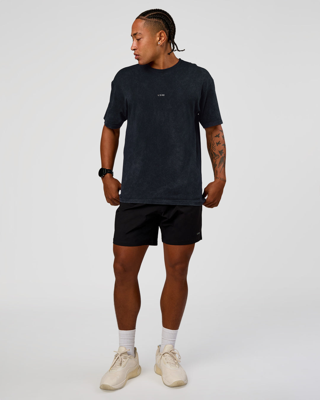 Man wearing Power Oversized Tee - Black Washed | Model:Malebo | Size:M