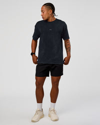 Man wearing Power Oversized Tee - Black Washed | Model:Malebo | Size:M