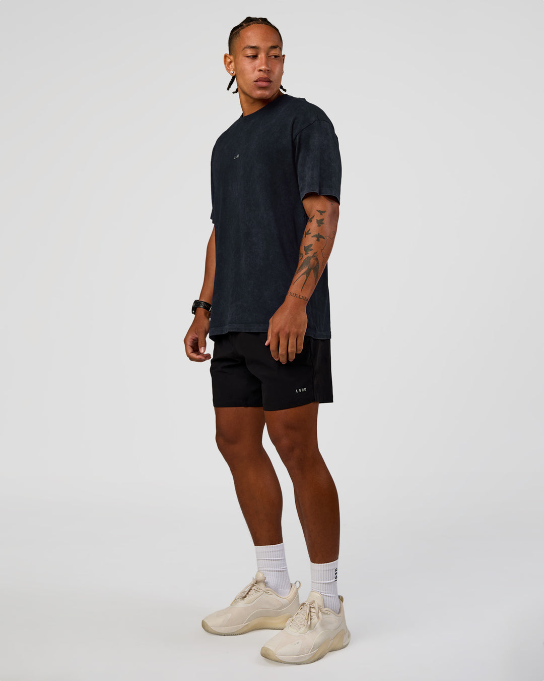 Man wearing Power Oversized Tee - Black Washed | Model:Malebo | Size:M