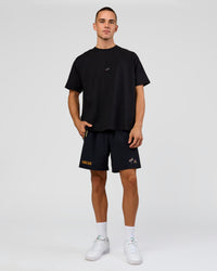 Man wearing Pride Rep 7" Training Shorts - Black - Black | Model:Albert | Size:M