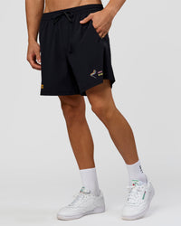 Man wearing Pride Rep 7" Training Shorts - Black - Black | Model:Albert | Size:M