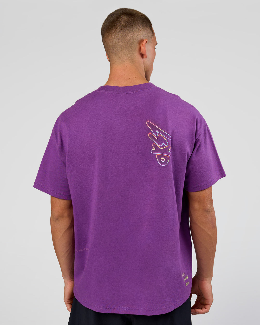 Man wearing Pride Sticker Boxy Tee - Fresh Purple | Model:Albert | Size:M