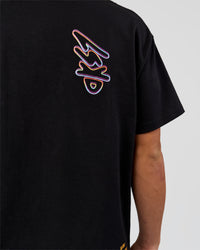 Man wearing Pride Sticker Boxy Tee - Black | Model:Albert | Size:M