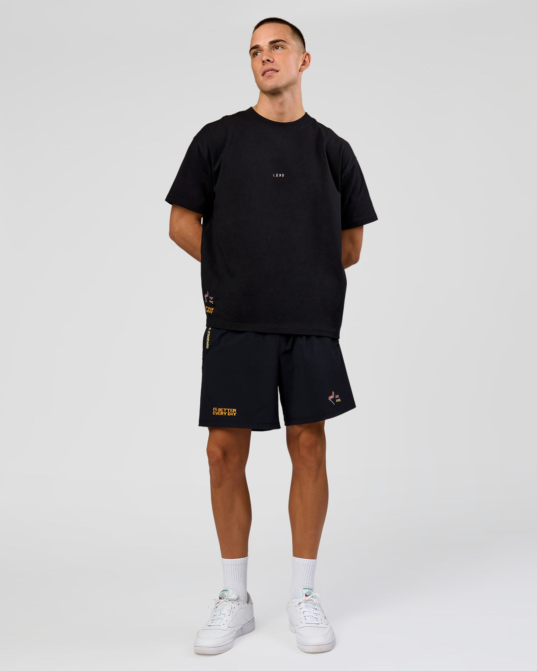 Man wearing Pride Sticker Boxy Tee - Black | Model:Albert | Size:M