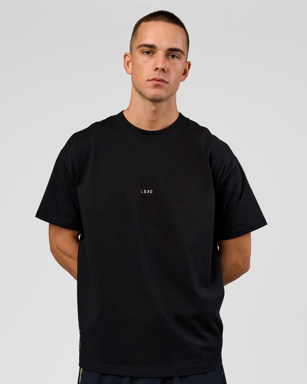 Man wearing Pride Sticker Boxy Tee - Black | Model:Albert | Size:M